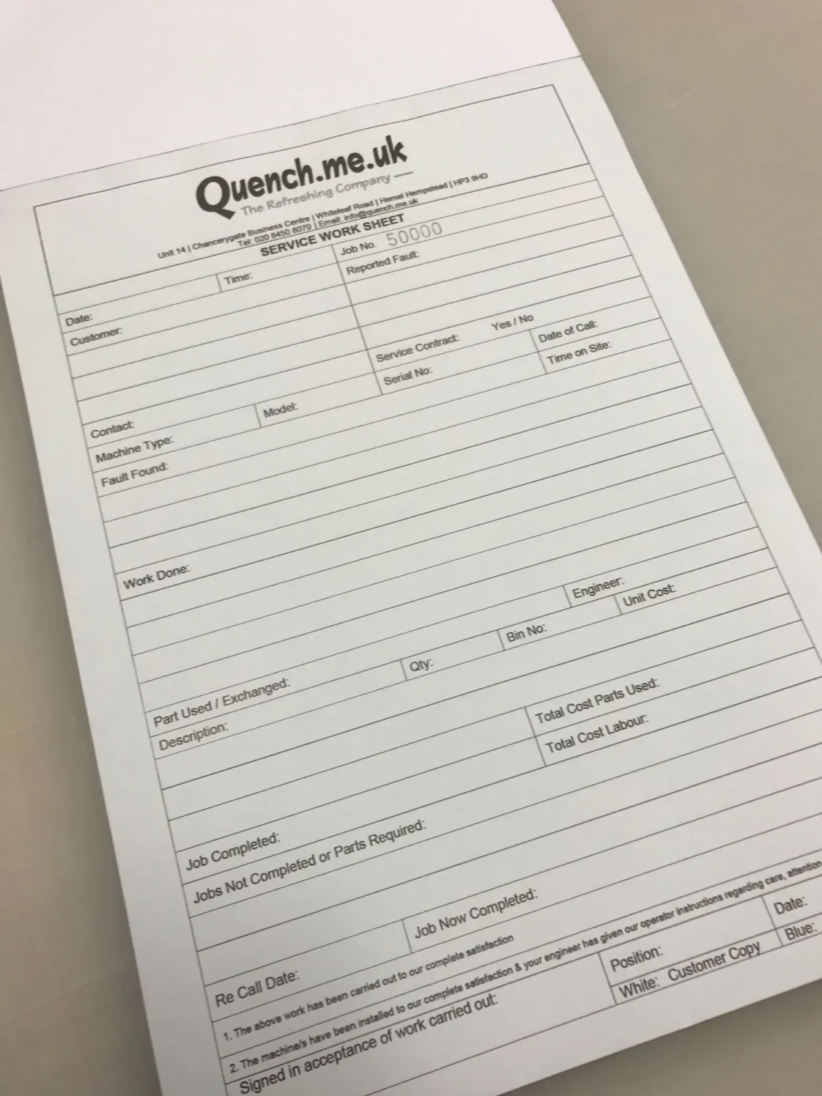 Quench service work sheet form on desk