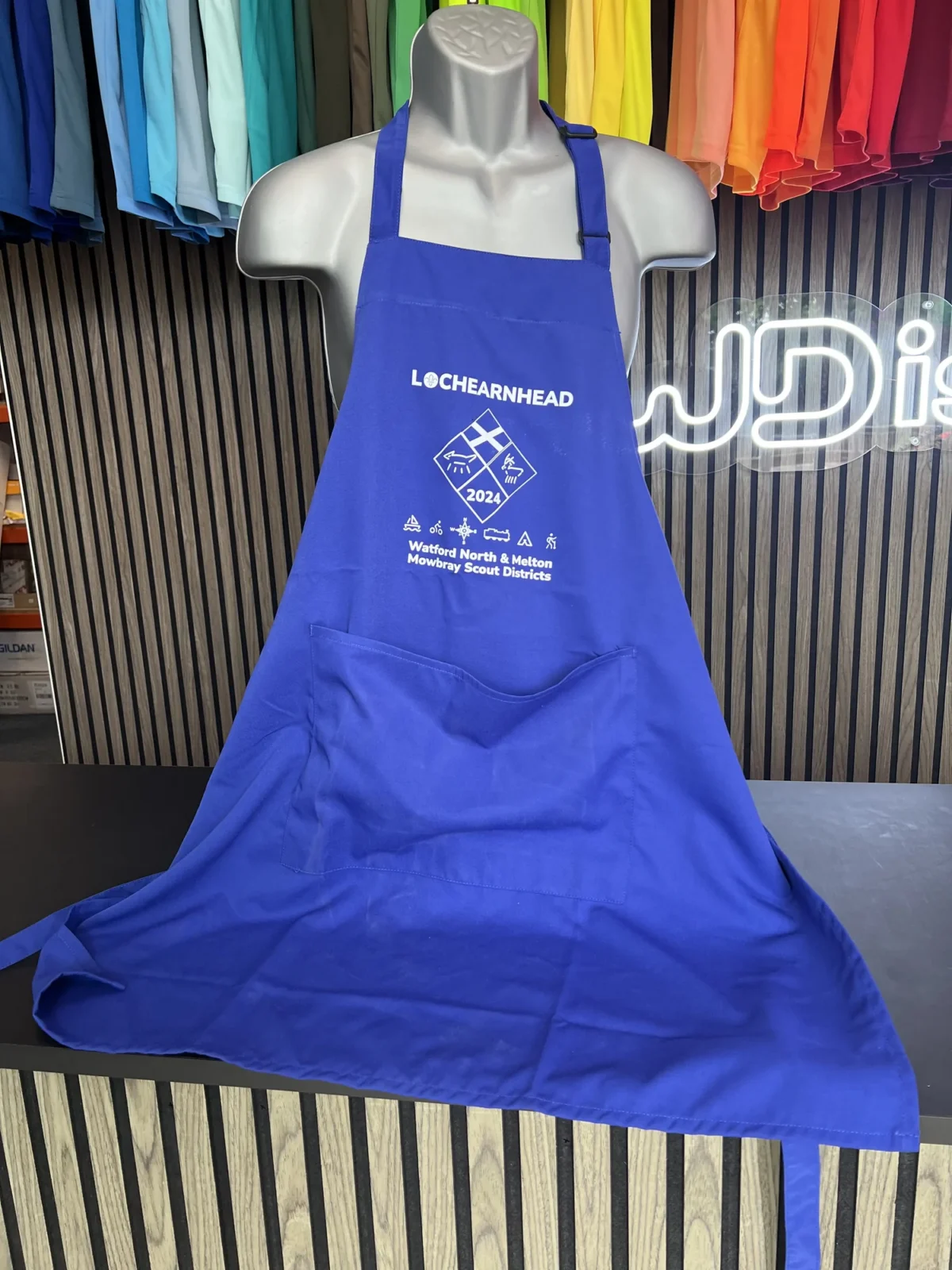Blue Scout district apron with printed Lockearnhead 2024 logo