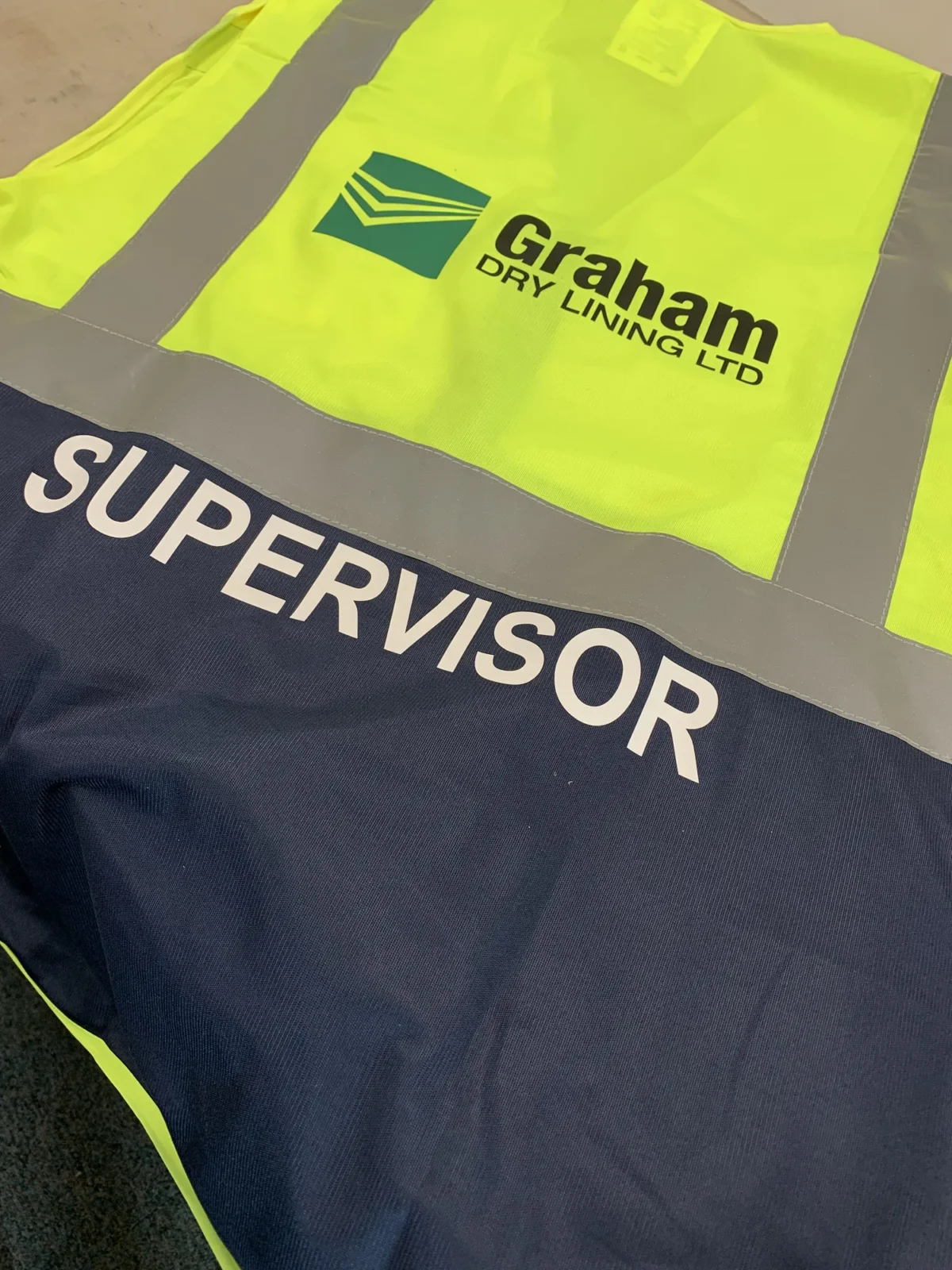 Graham Dry Lining branded high-visibility supervisor vest