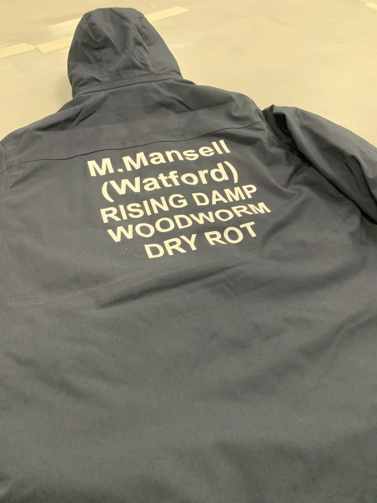Work jacket printed M. Mansell Watford Rising Damp Woodworm Dry Rot
