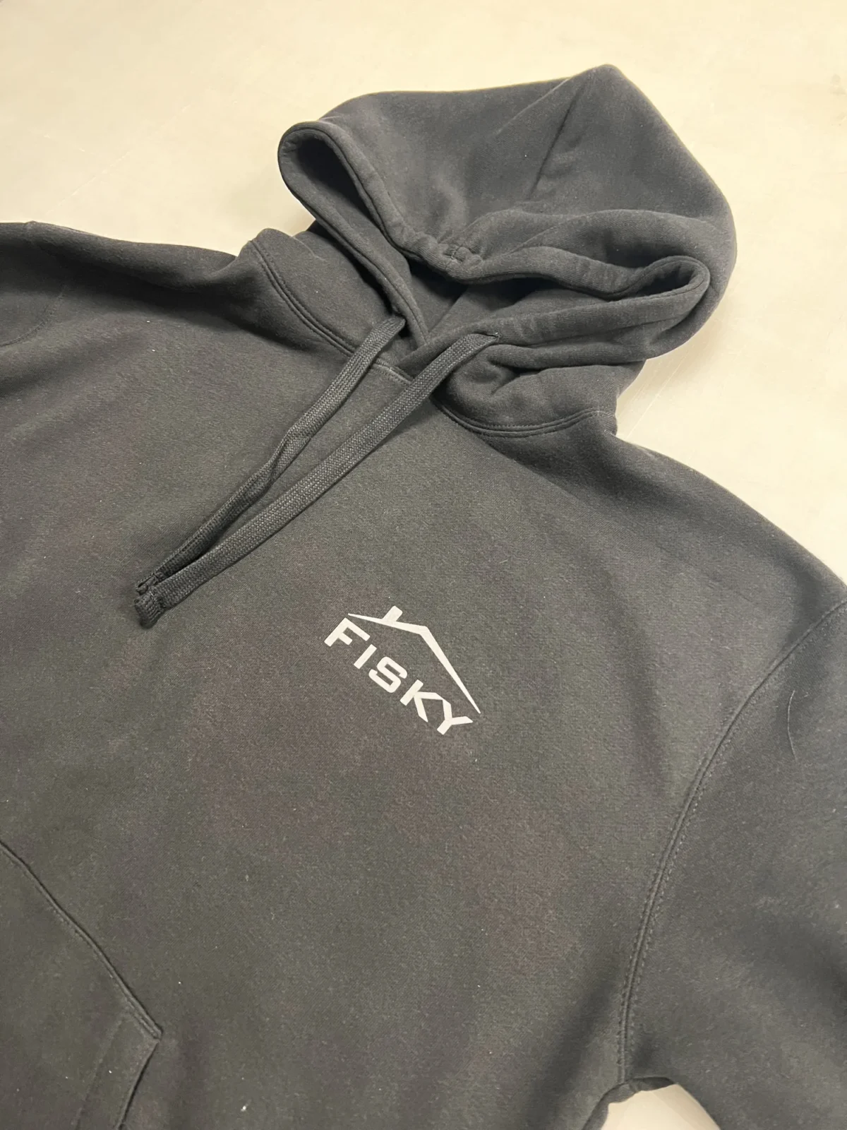 Black Fisky hooded sweatshirt with white chest logo