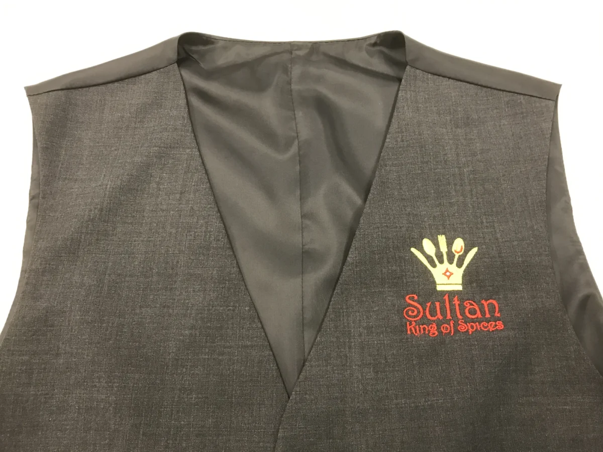 Grey waistcoat embroidered with Sultan King of Spices logo