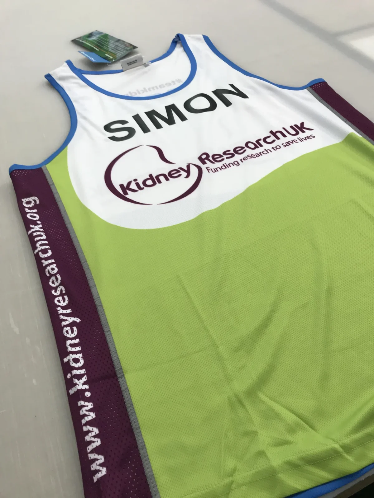 Kidney Research UK charity running vest with SIMON print