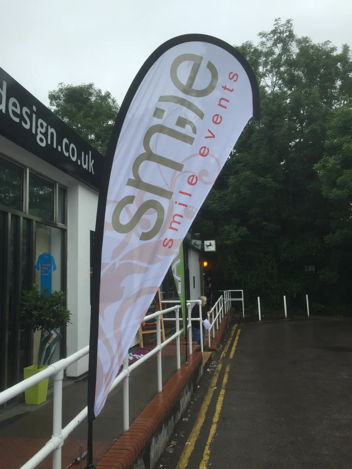 Spire events flag outside leisure centre entrance
