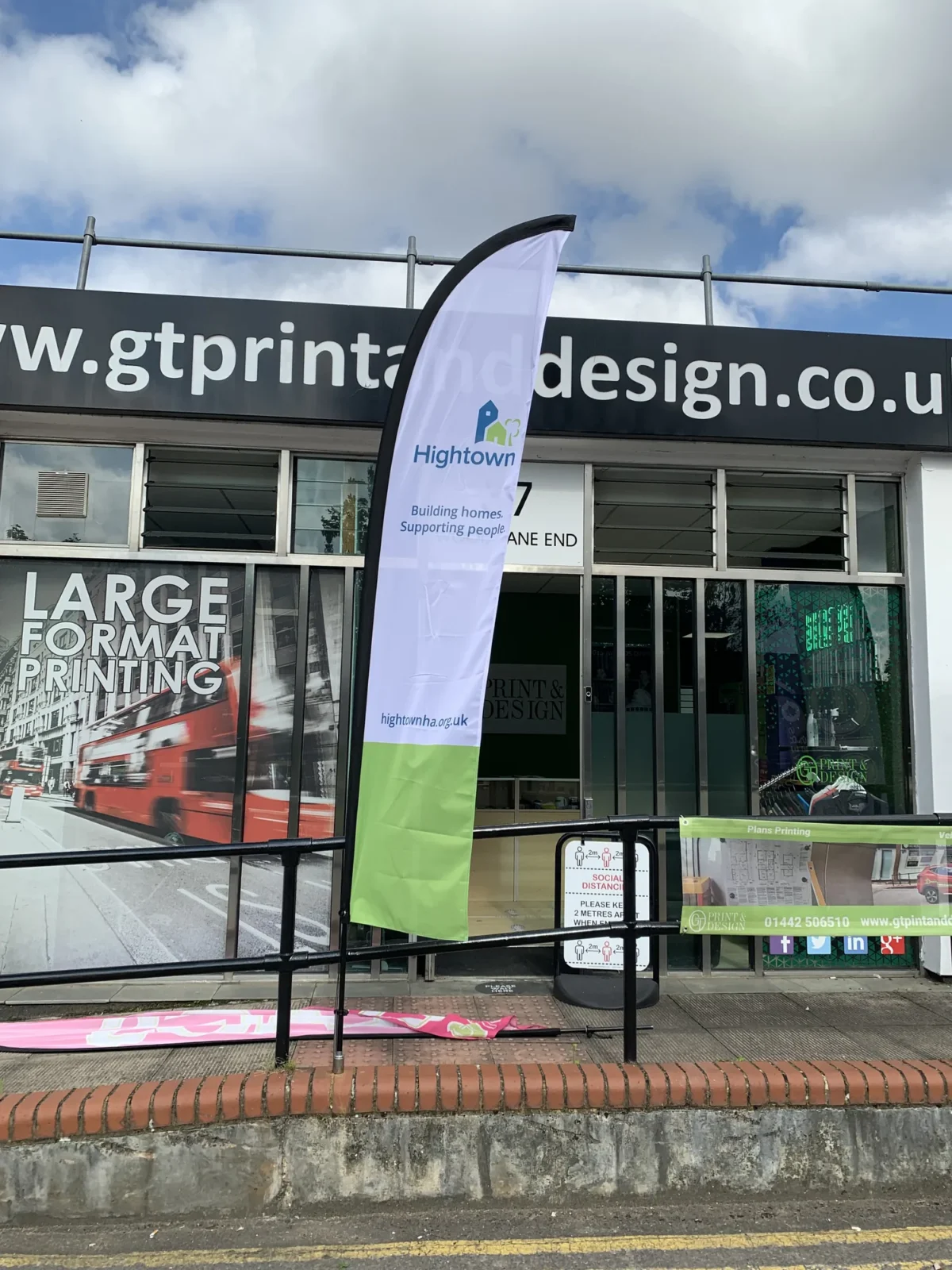 Hightown promotional flag outside G T Print and Design shop