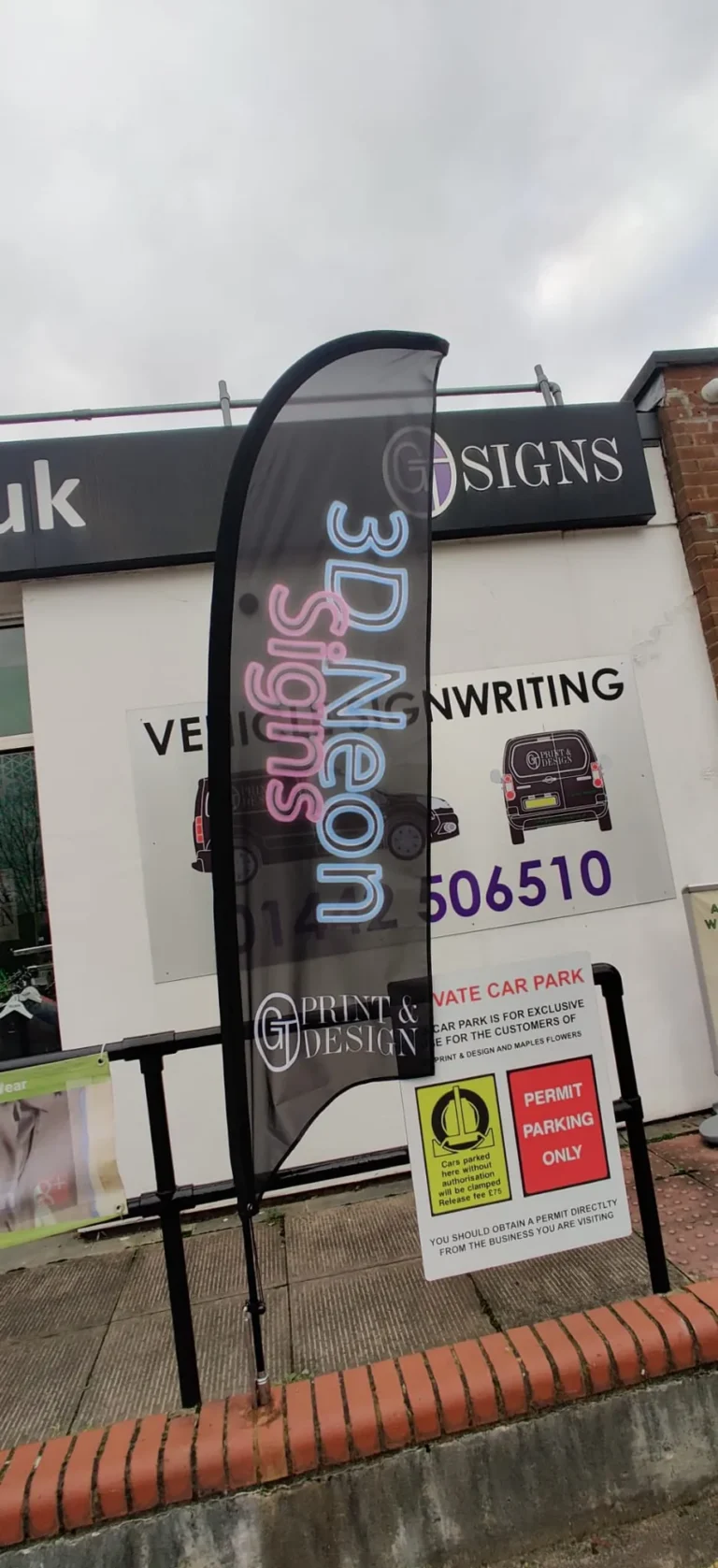 3D signs feather flag outside Print and Design shop