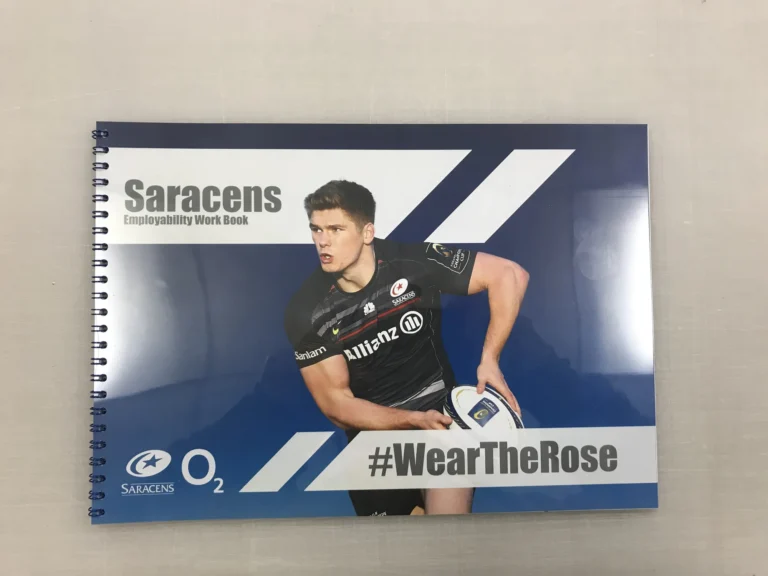 Saracens employability workbook featuring rugby player holding ball