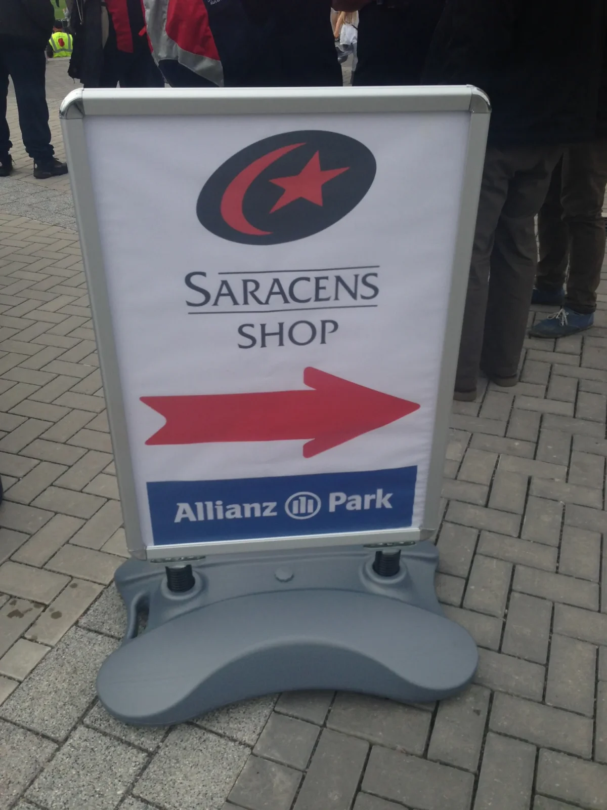 Saracens shop sign with right-pointing arrow at Allianz Park