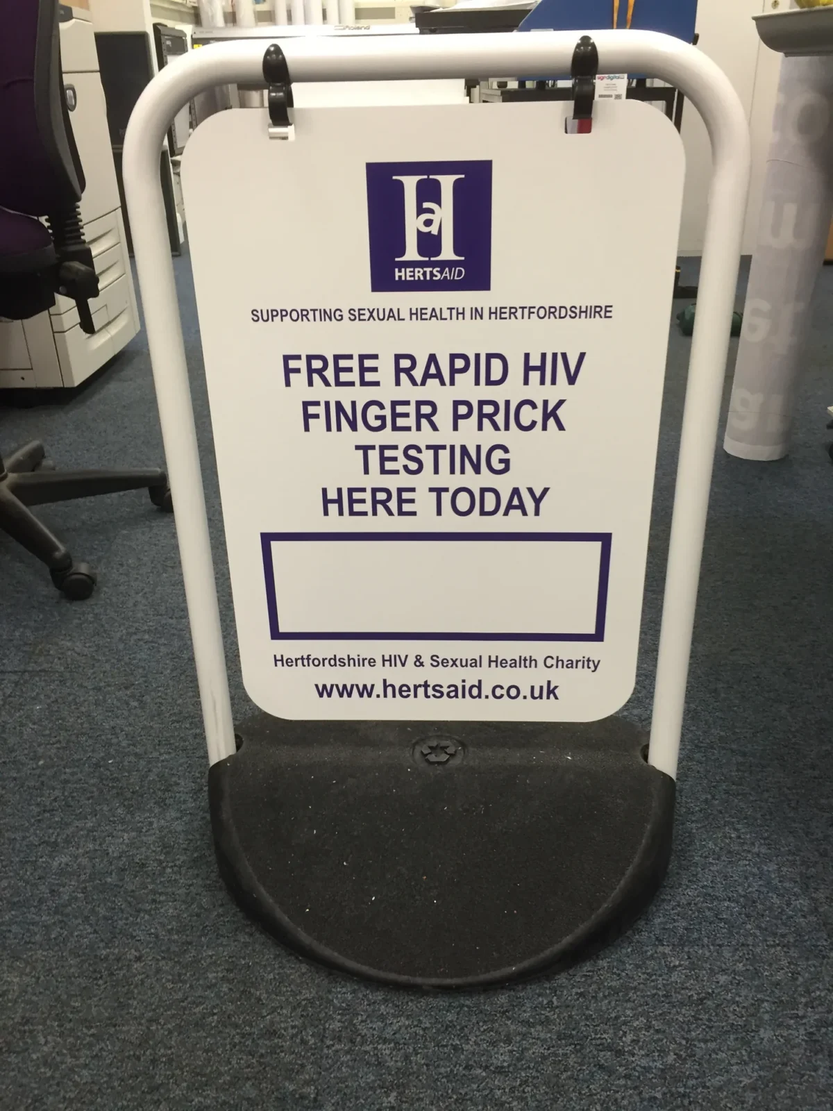 Herts Aid sign advertising free rapid HIV finger-prick testing