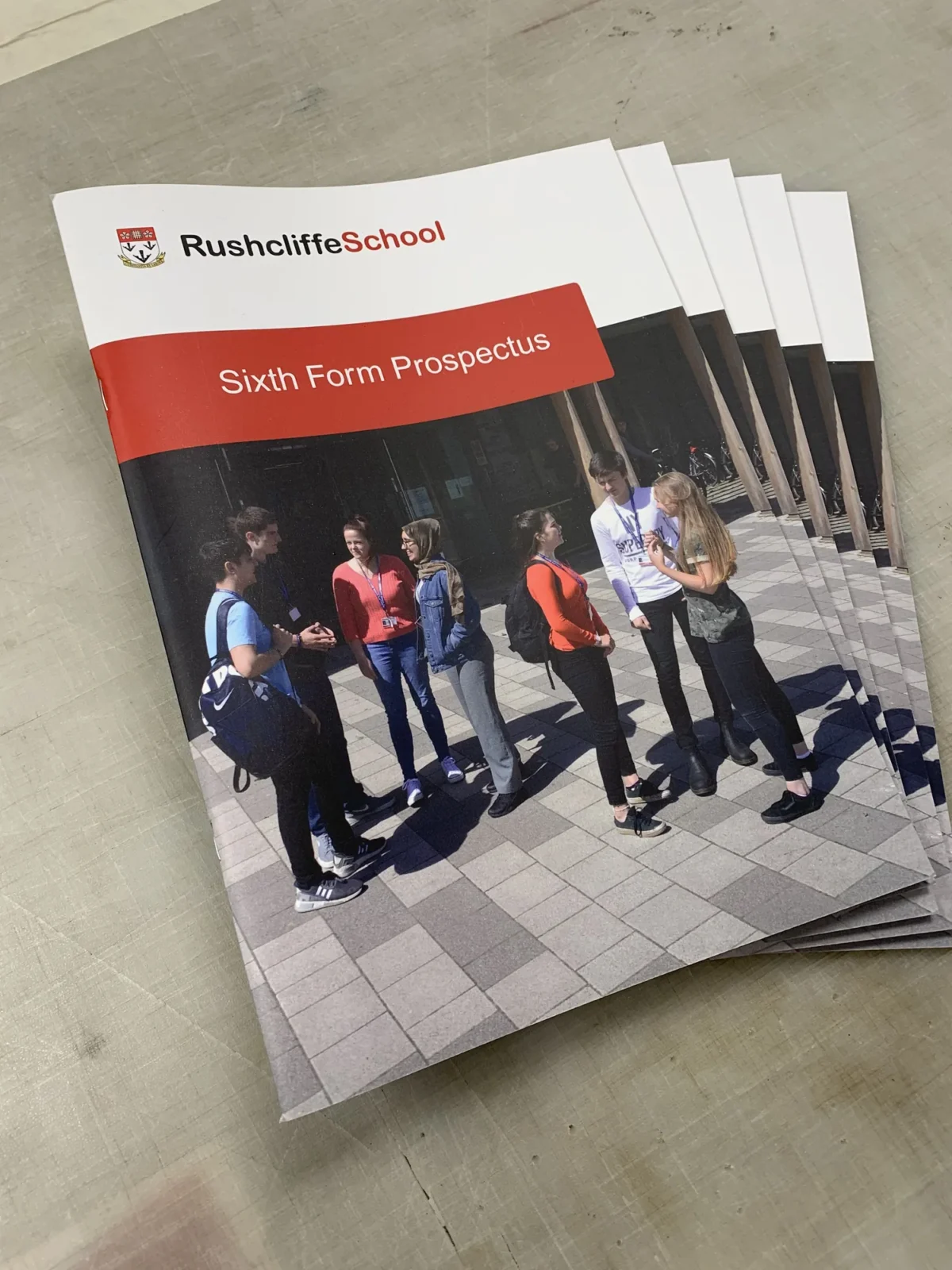 Rushcliffe School Sixth Form prospectuses brochure featuring students outdoors