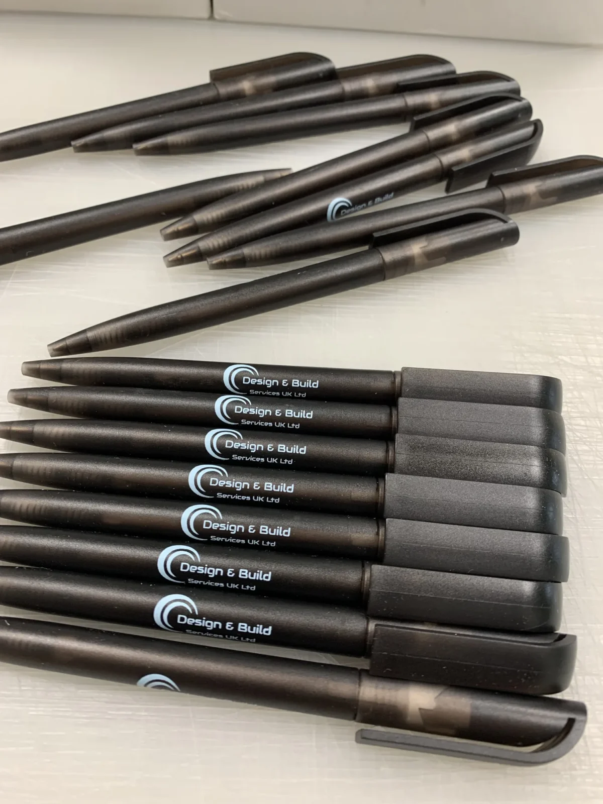 Black branded Design & Build Services UK Ltd pens