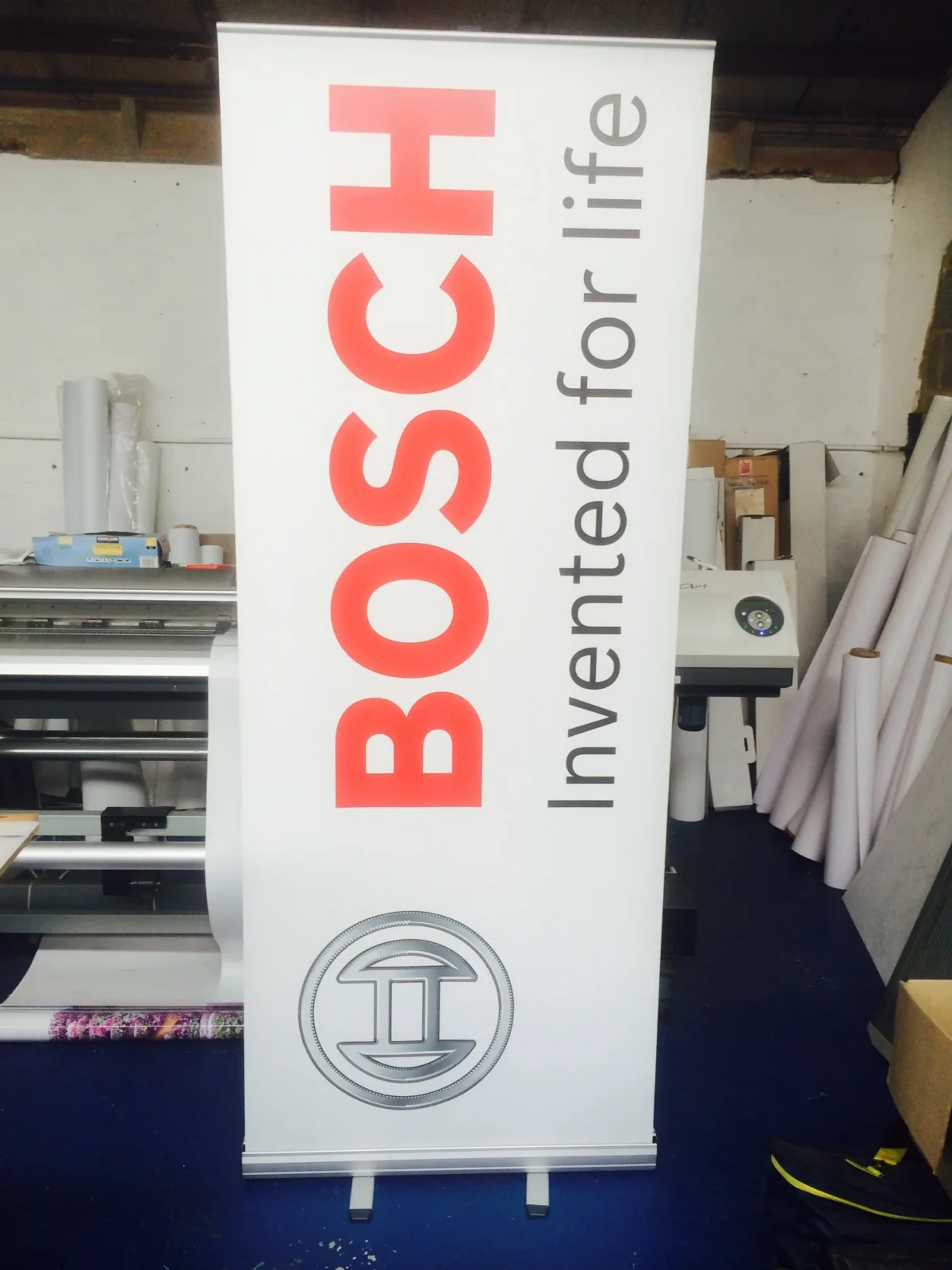 BOSCH Invented for Life promotional banner in print workshop