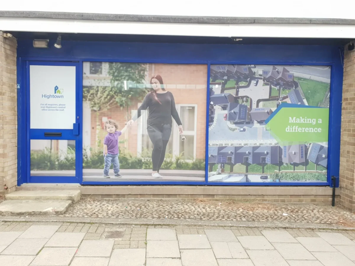Hightown office frontage with housing charity promotional window graphics