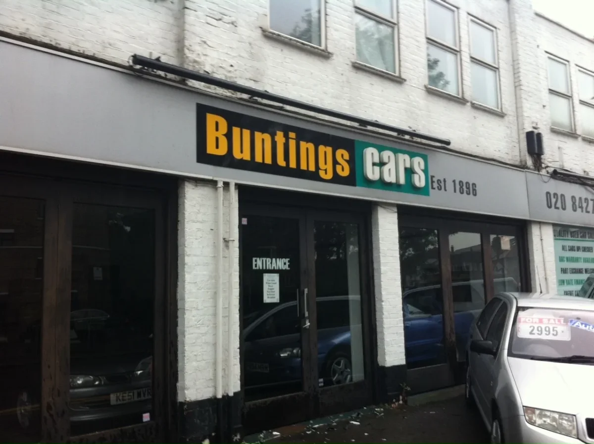 Buntings Cars dealership entrance with vehicles outside