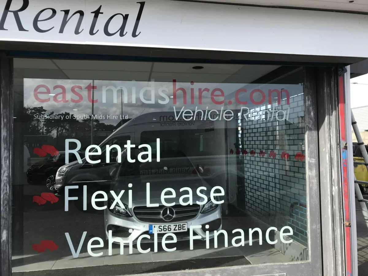 East Midlands Hire rental office window with Mercedes car