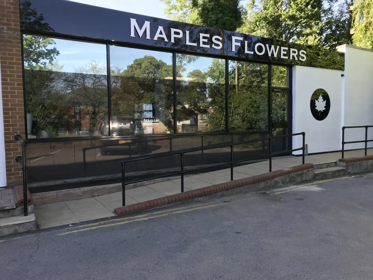 Maples Flowers shopfront with maple leaf logo and ramp