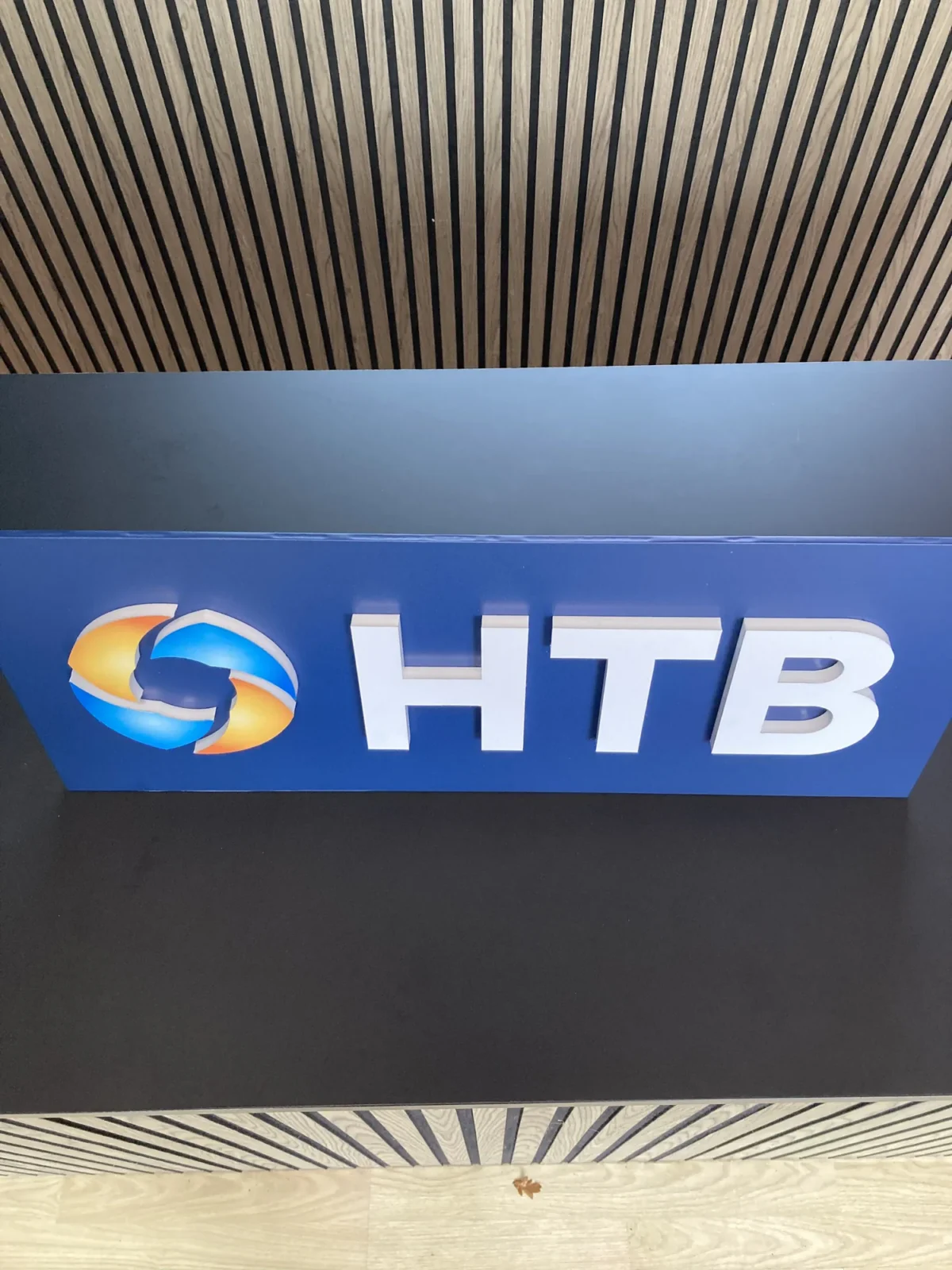 HTB logo on blue reception desk