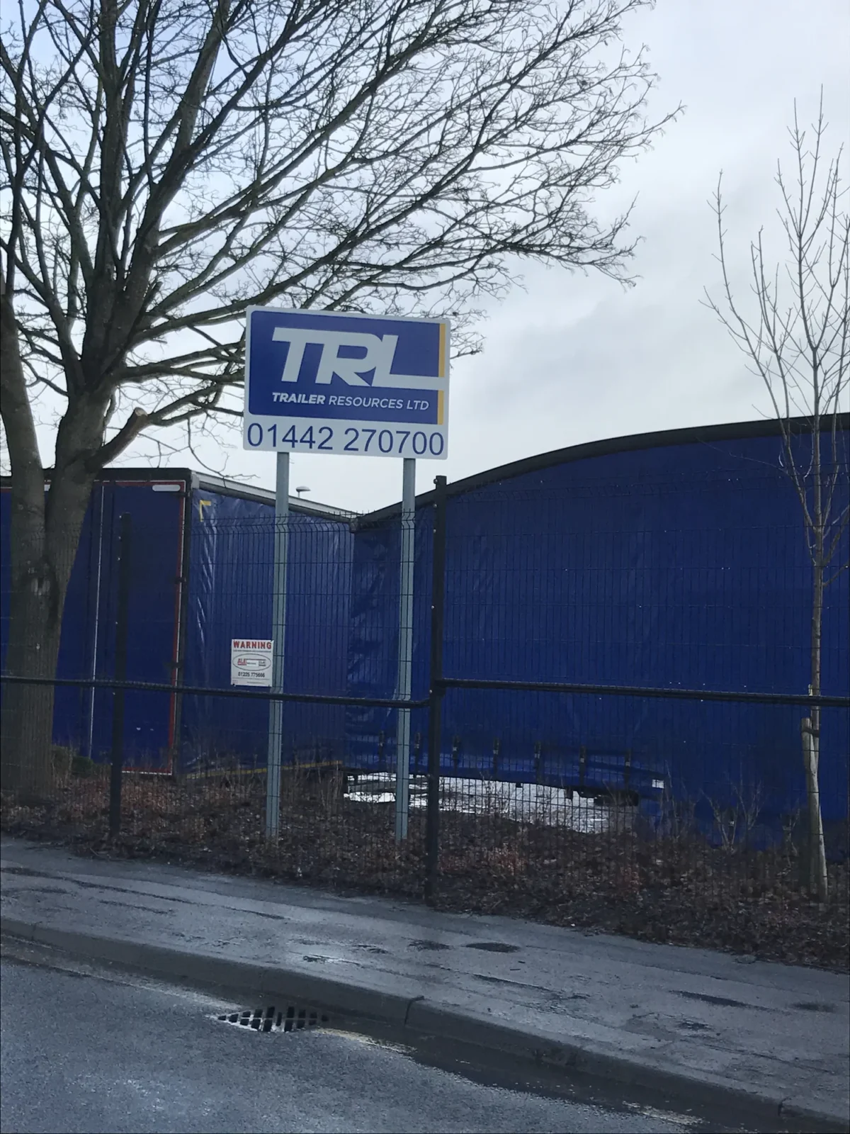 Trailer Resources Ltd sign outside blue trailer depot