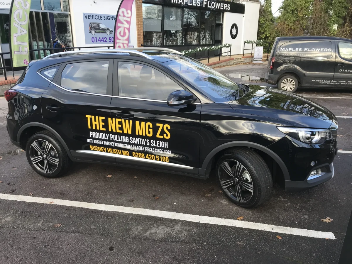 Black MG ZS charity vehicle outside Maples Flowers shop